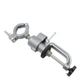 Bench vise with rotating bracket clamped to workbench edge
