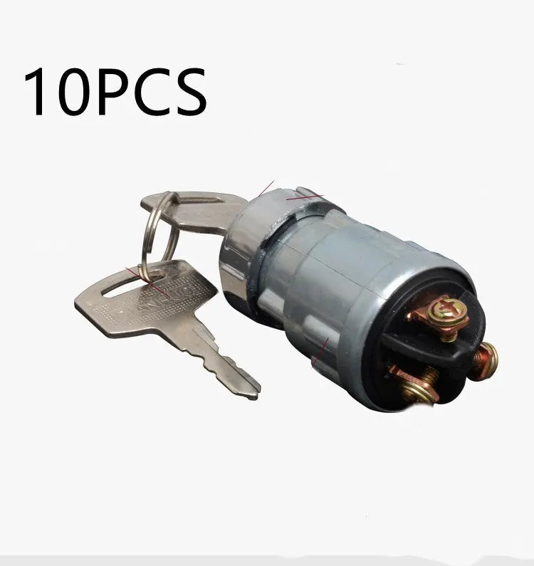 Copper ignition switch with key for trucks and forklifts, showing colour-coded key options