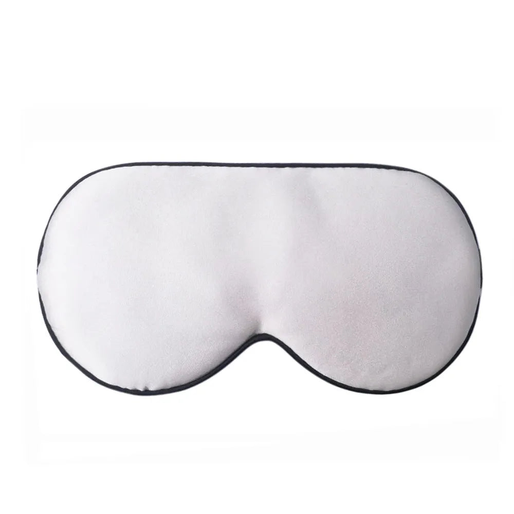 Double-sided mulberry silk sleep eye mask with embroidered printed pattern in various colours.