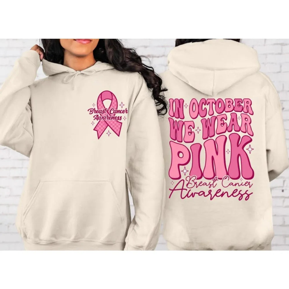 Breast cancer awareness pullover hoodie with retro art print in pink, featuring side seam pockets.