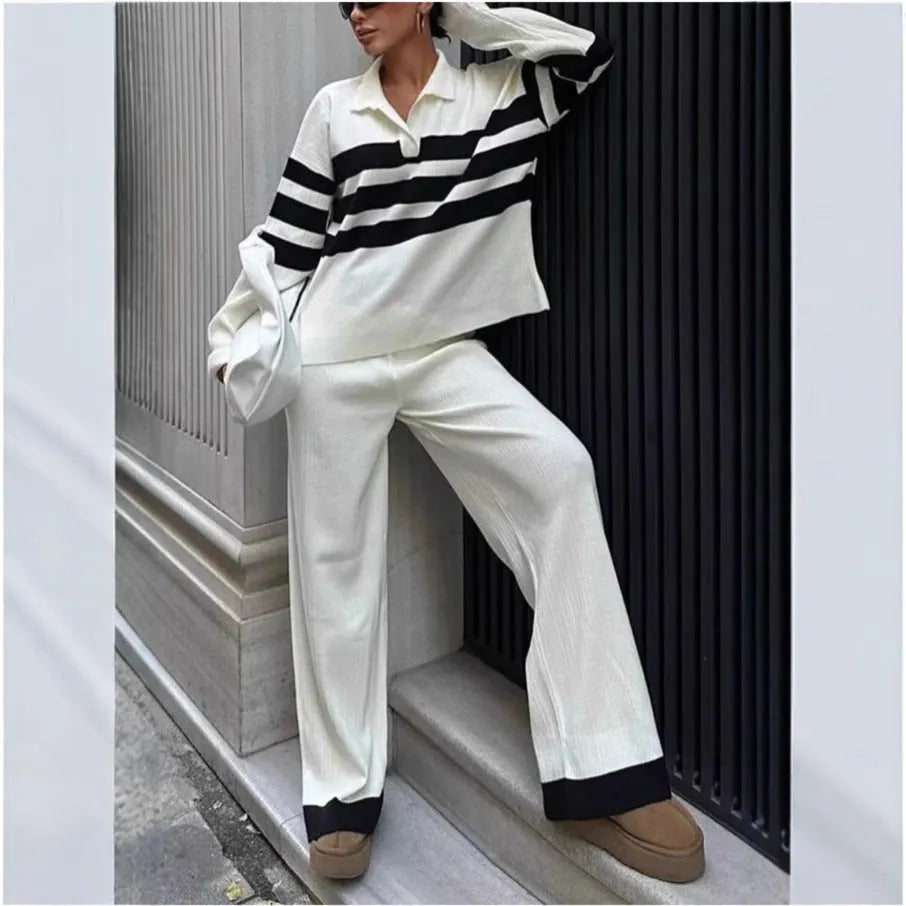 Women's black and white striped polo collar two-piece set with long sleeve shirt and trousers