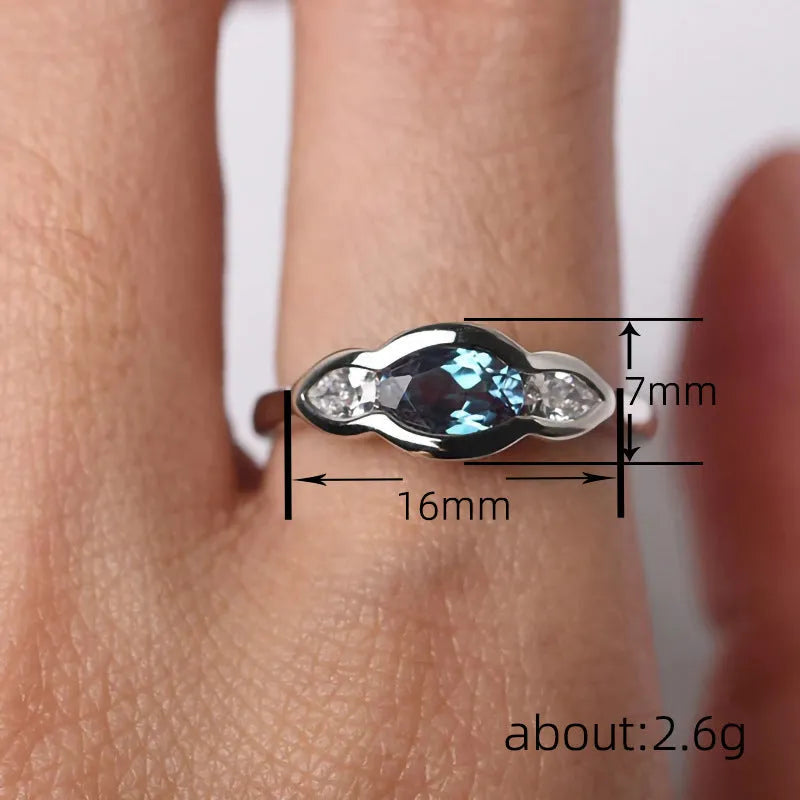 Geometric ellipse copper ring with zircon stone inlay and white gold finish