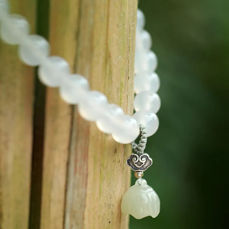 S925 silver bracelet with white agate and Hetian jade stones in geometric lotus design