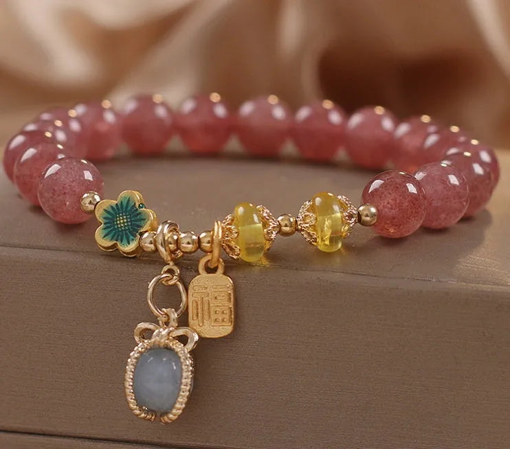 Red strawberry quartz beaded bracelet with alloy metal and rhinestone detailing for women's jewellery