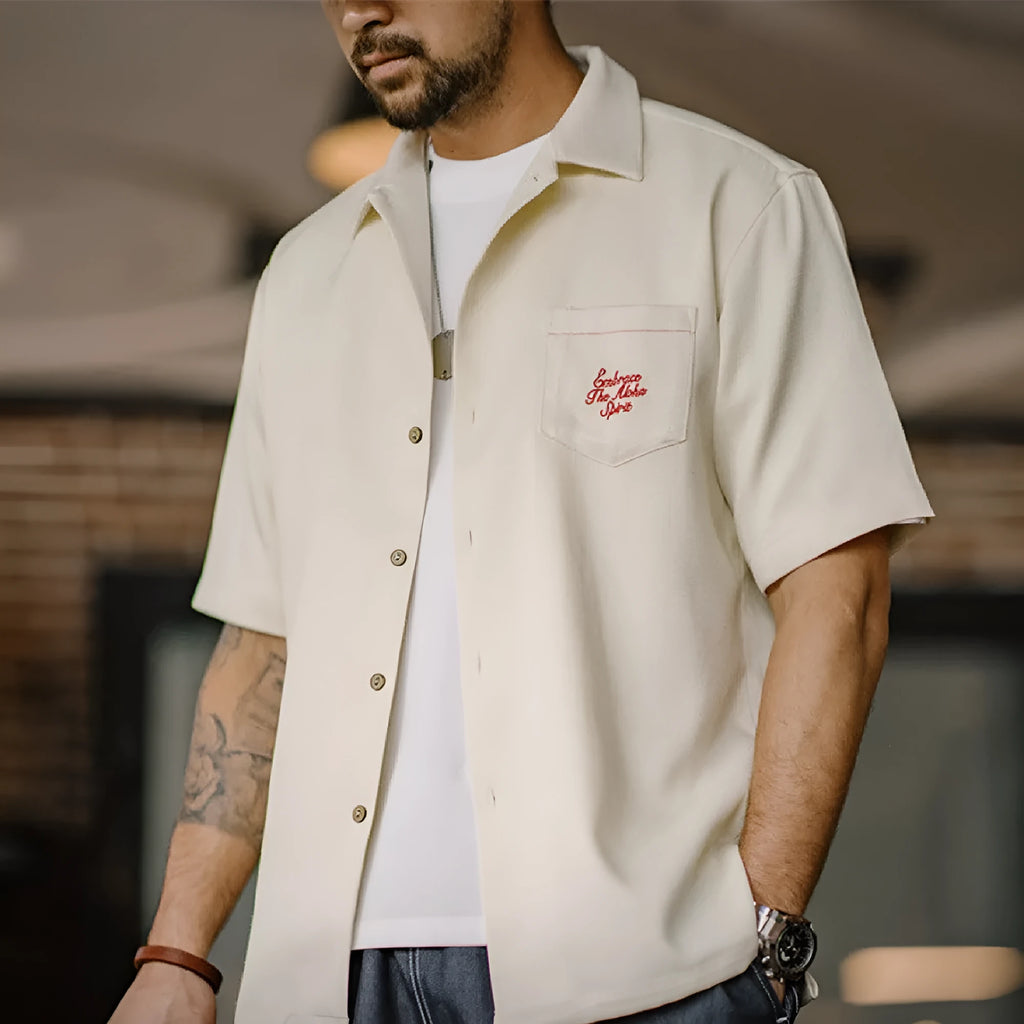 Light apricot men's Cuban collar shirt with bamboo plant and flower pattern