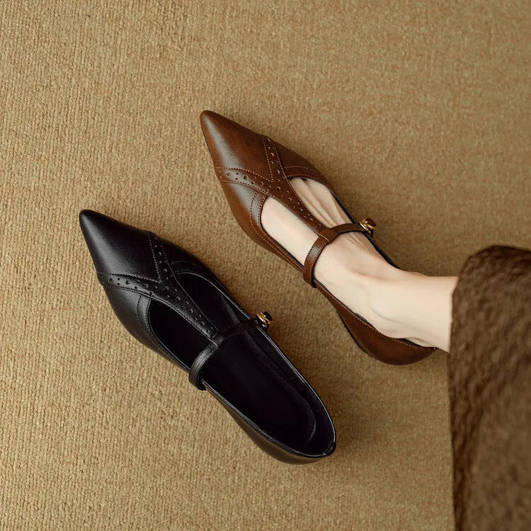 Brown pointed toe women's flat shoes with a low-cut design and metal detail.
