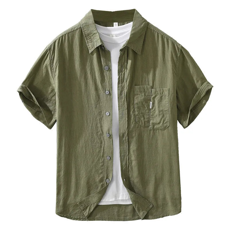 Women's loose lyocell cardigan-style top in black, green, and purple colours on a hanger.