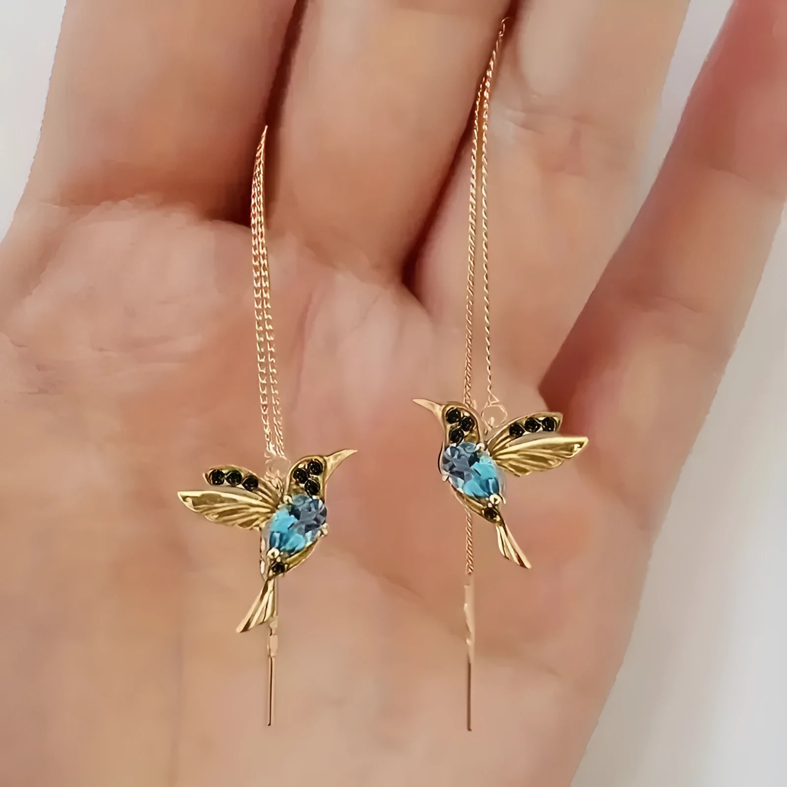 Personalised bird hanging long style earrings with zirconium wing detailing in red, blue, and red lvzuan colour options