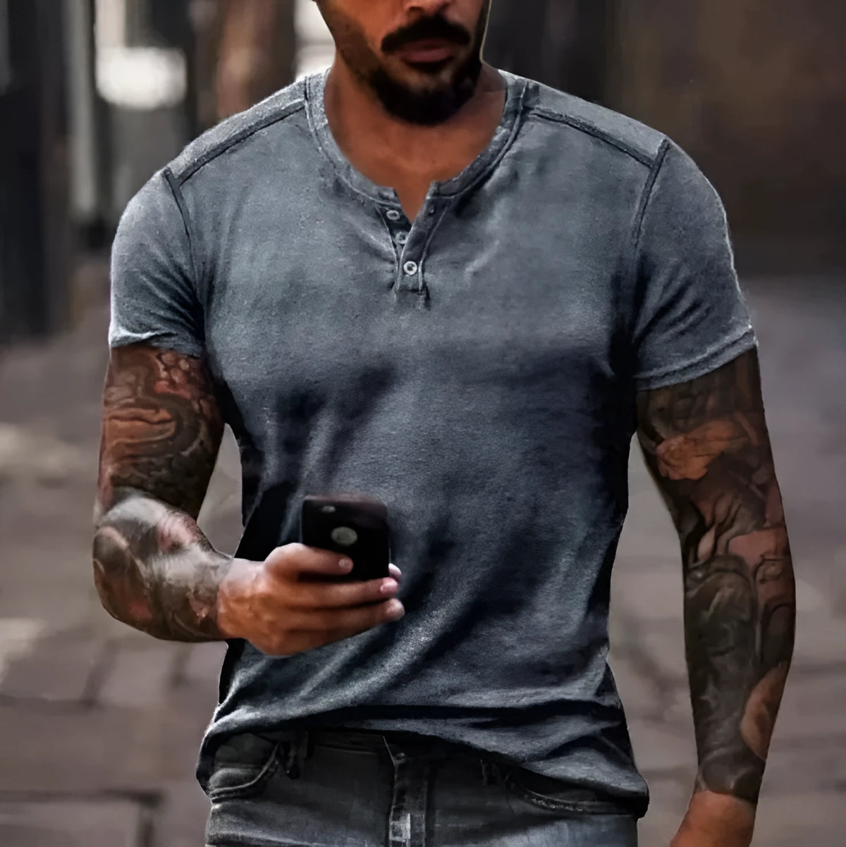 Men's grey short sleeve sports shirt with a 3D printed abstract colour pattern and a lapel button.