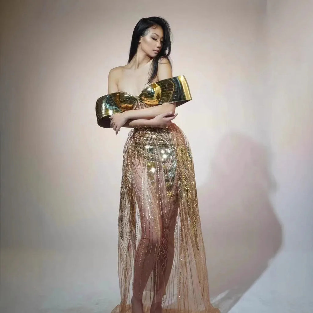 Gold strapless sequin evening dress with thigh-high split and floor-length silhouette