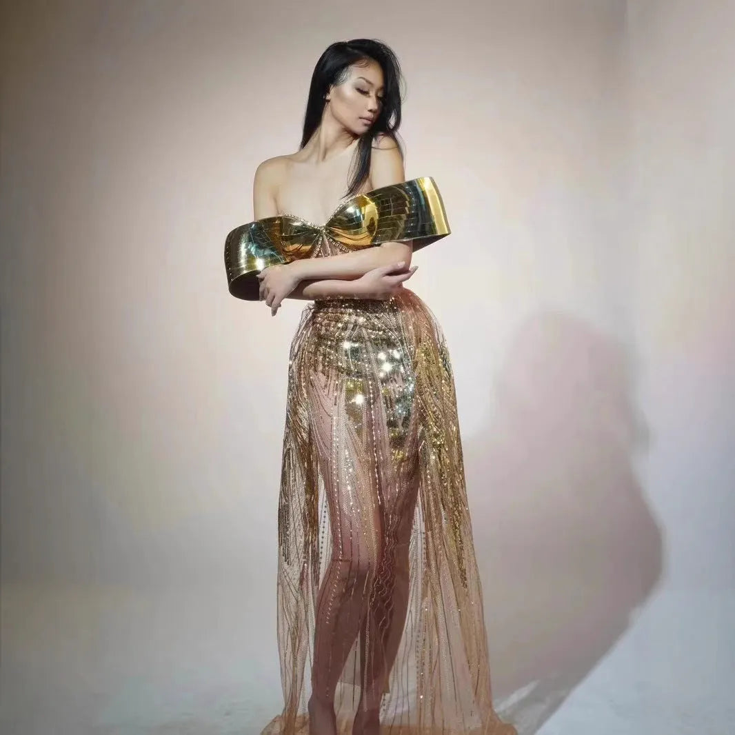 Gold strapless sequin evening dress with thigh-high split and floor-length silhouette