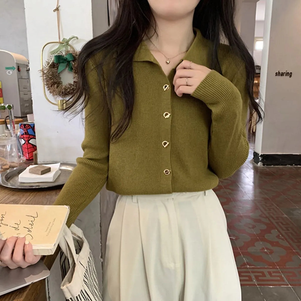 Long-sleeved oversized viscose cardigan in beige, black, oatmeal, green, or khaki, laid flat.