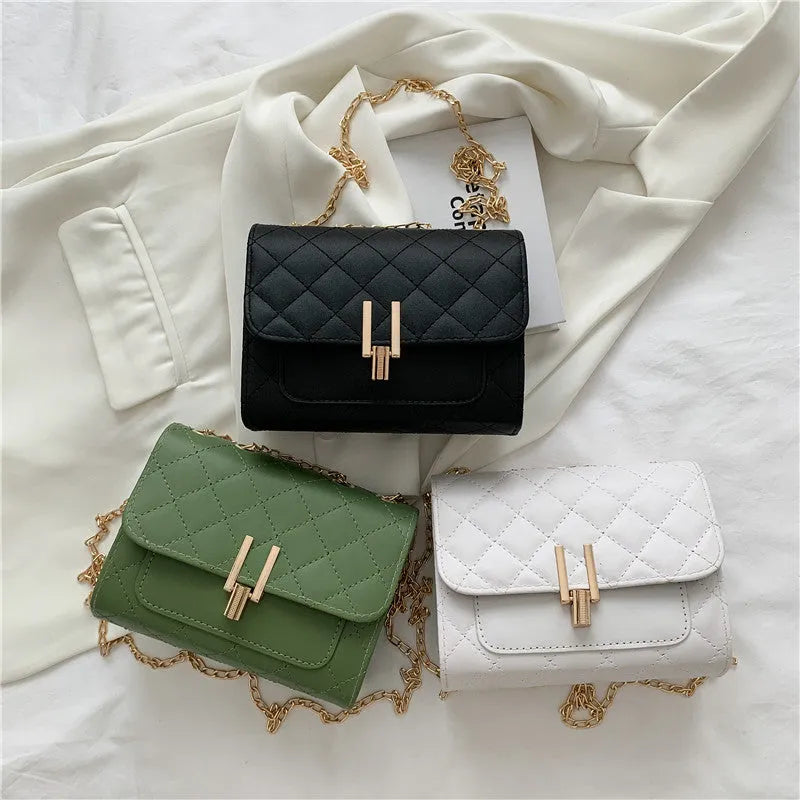 Women's white diamond lattice chain crossbody bag with adjustable shoulder strap showing dimensions