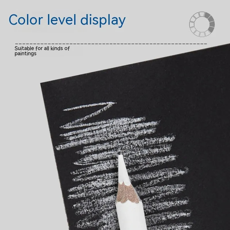 Three white charcoal drawing pencils with wooden barrels for sketching and highlighting