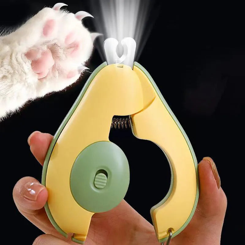 Pet nail clipper with LED light showing green handle and stainless steel blades for small dogs and cats