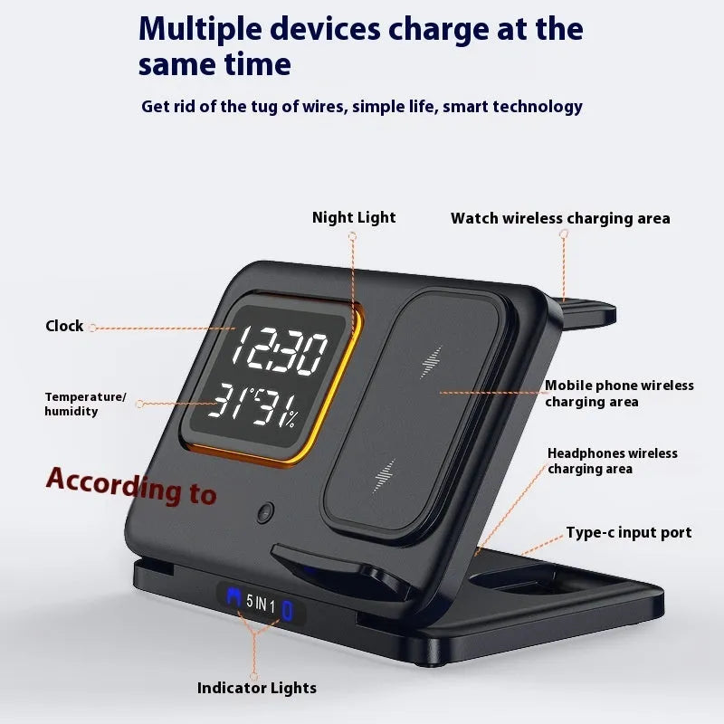 Black wireless charging station with digital clock displaying time and temperature charging phone and watch
