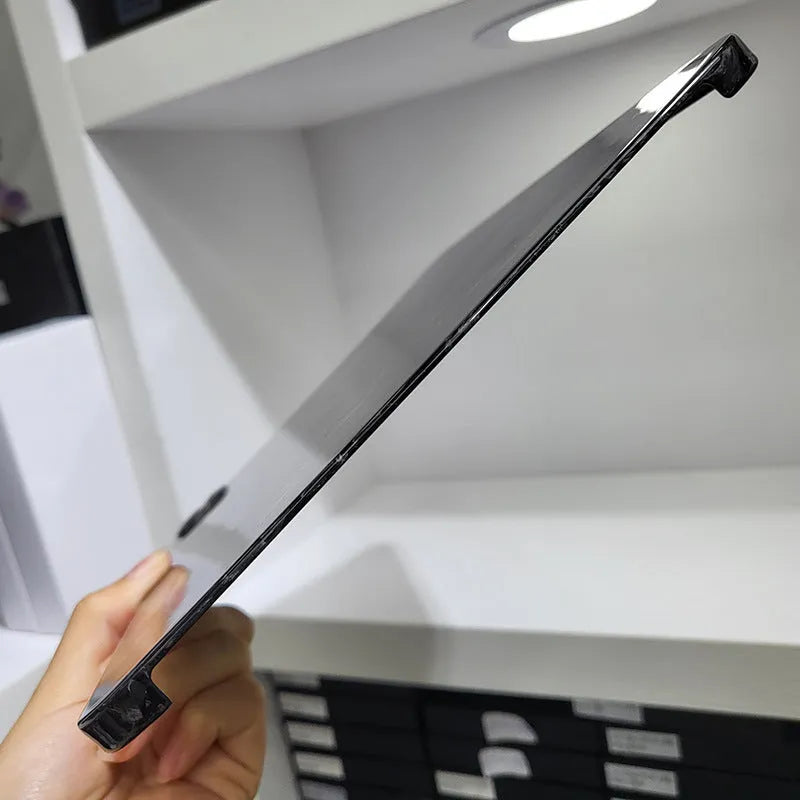 Carbon fibre hard case for Apple iPad Pro 11 showing embossed plaid pattern and matte finish.