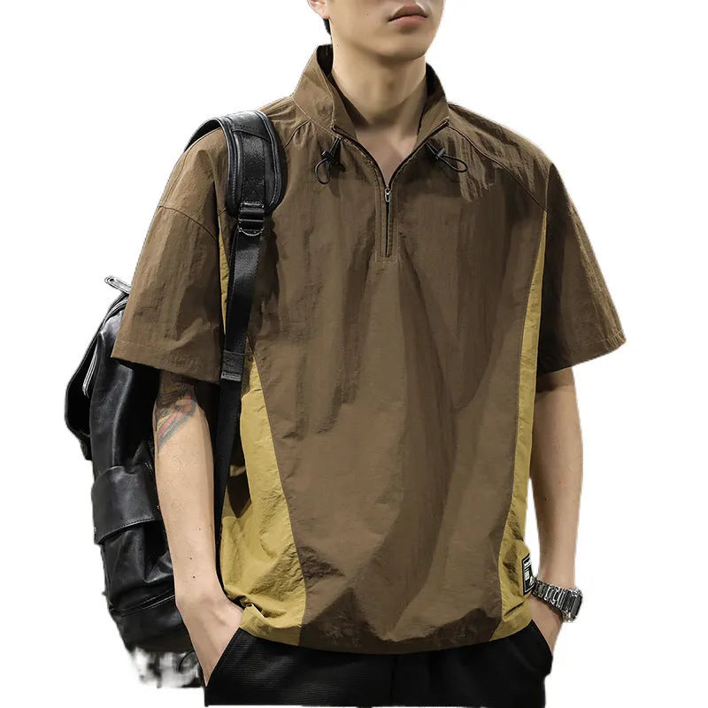 Men's brown half-zip short sleeve casual shirt with a stand collar, shown in a loose fit.