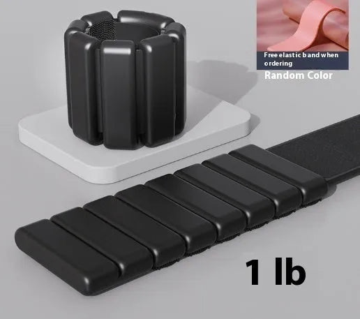 Silicone fitness weight bracelet with Velcro strap shown in black, blue, grey, or pink.