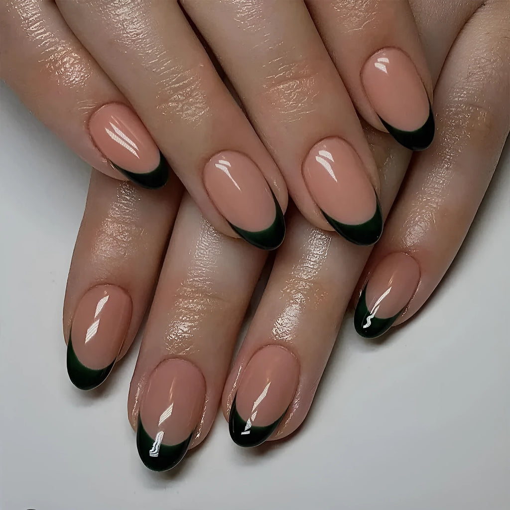 24 piece set of short almond shaped false nails with a simple black French style design.