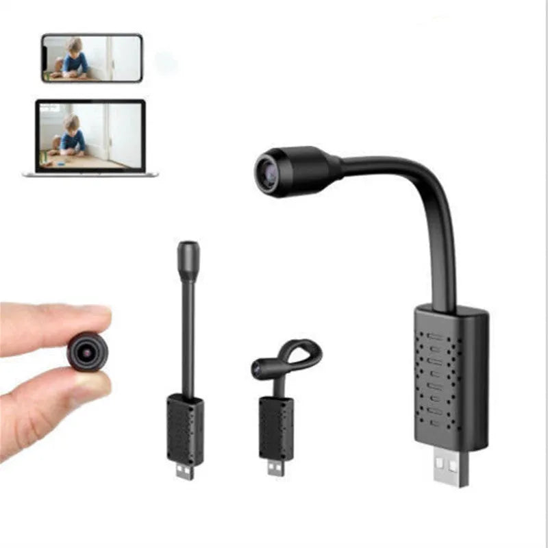 Black V380 wireless USB HD security camera showing its compact size and USB connection port.