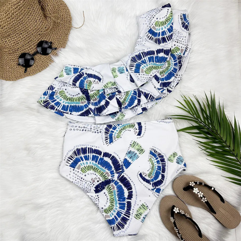 White women's one-shoulder swimsuit with lotus leaf skirt detail and double-layer construction