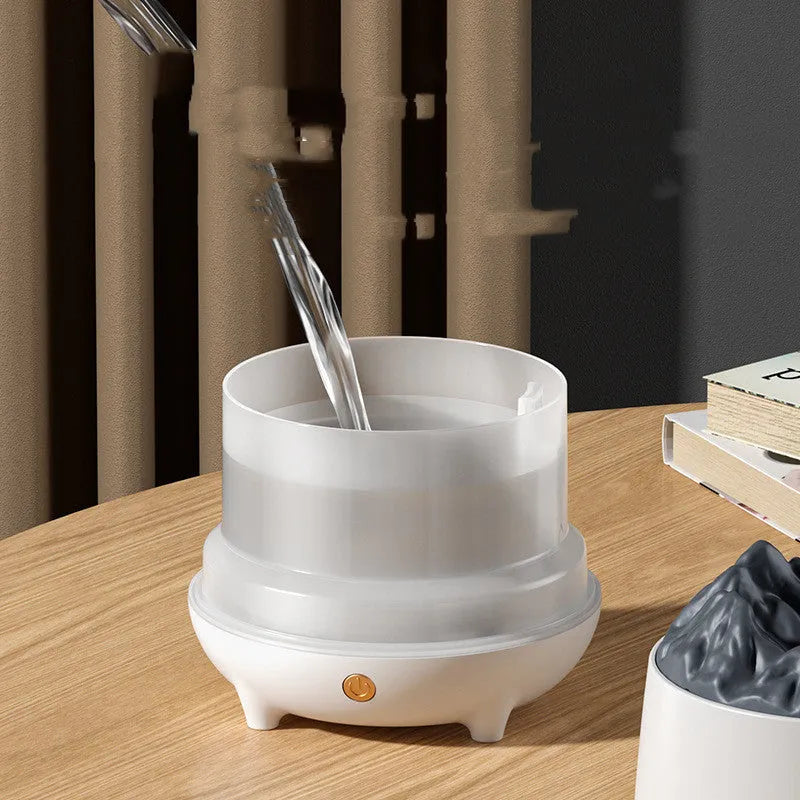 Black and white volcano-shaped ultrasonic humidifier with USB cable for rooms up to 20 square metres