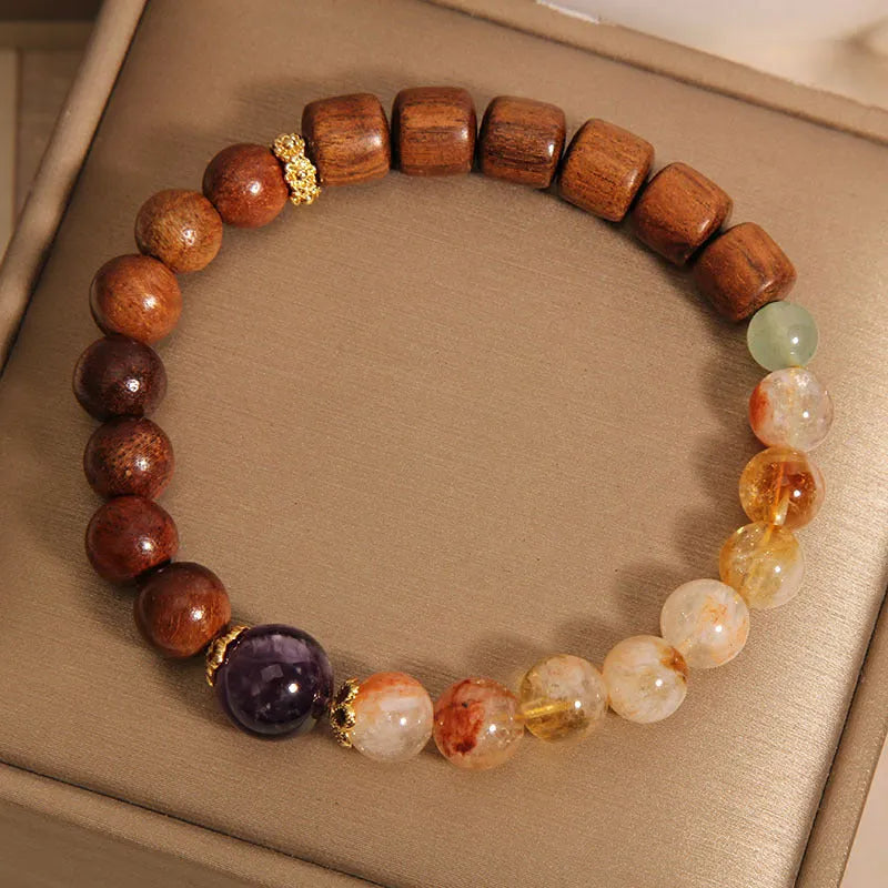 Women's pineapple yellow bracelet with yellow tower crystal, ebony amethyst beads, and pearl accents