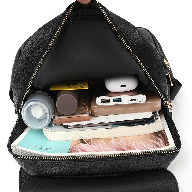 Casual women's backpack in soft PU leather with a three-dimensional pocket, shown in taro purple colour.