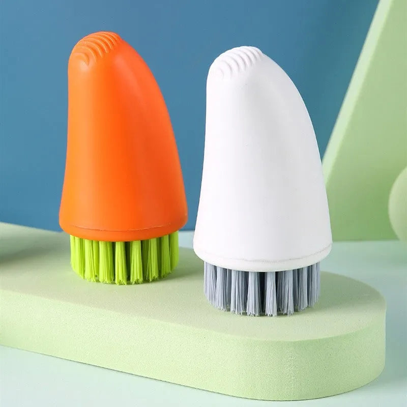 White and orange carrot-shaped nylon cleaning brush for kitchen use