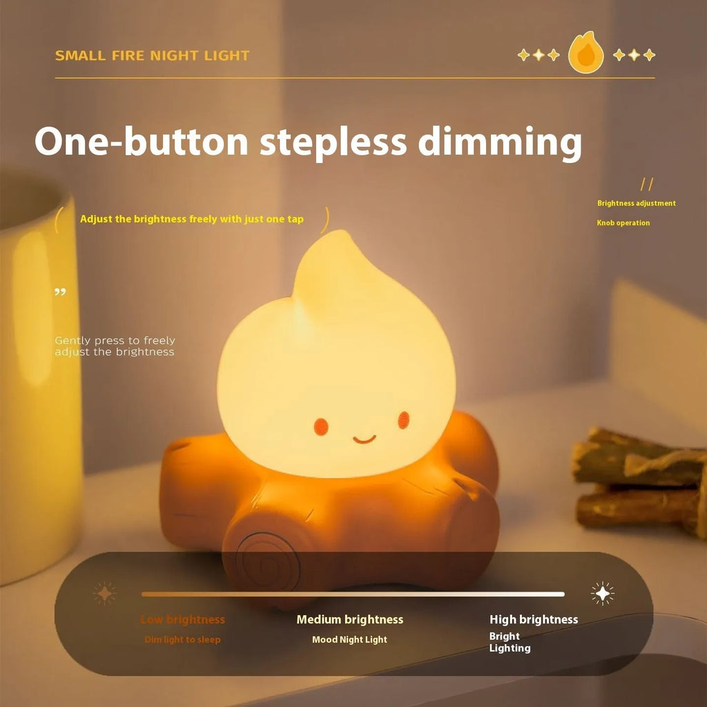 Small silicone fire pile night lamp with cartoon design showing yellow illumination