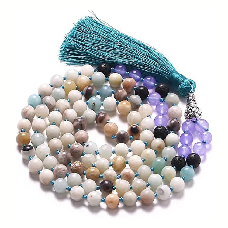Long beaded agate necklace with geometric stones and a tassel, showing colourful variations.