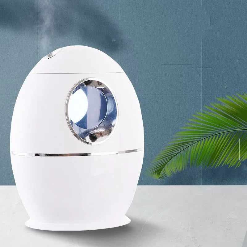 White columnar household air disinfection humidifier with USB cable and mechanical control dials.