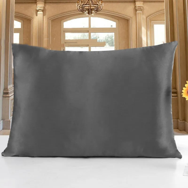 19 M double-sided silk pillowcase shown in apricot colour, lying flat to show envelope closure.
