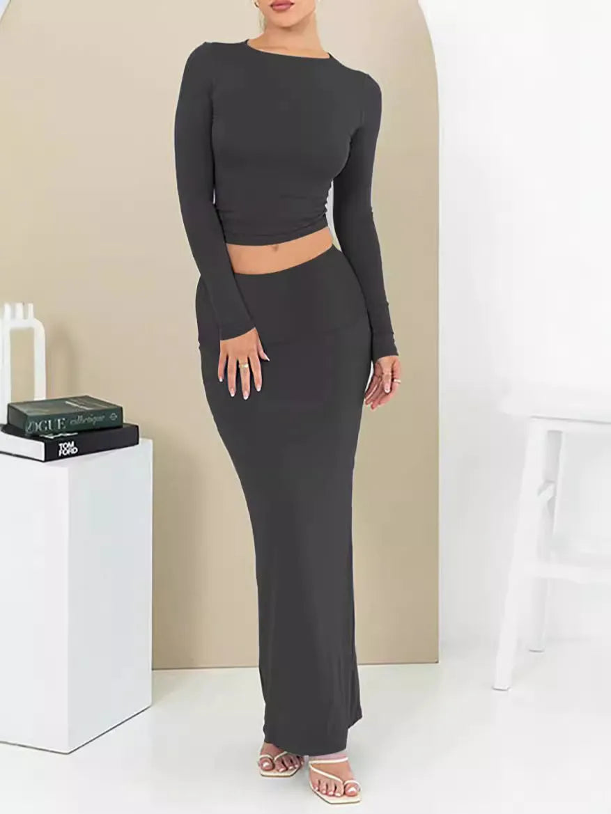 Women's sweet style polyester two-piece suit set with crop top and long skirt in autumn colours.