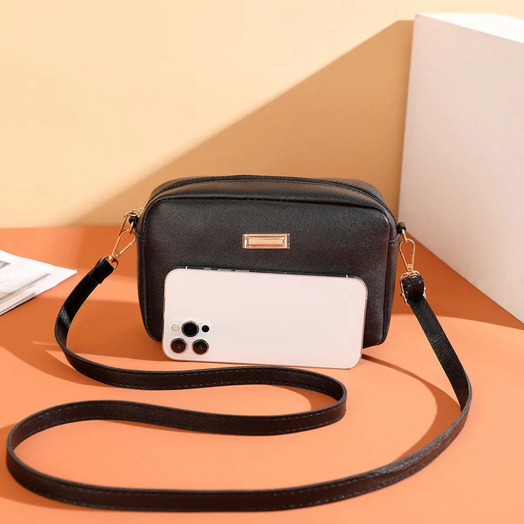 Solid-colour women's PU shoulder bag with three-dimensional pocket and horizontal square shape