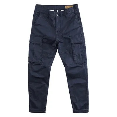 Men's cropped multi-pocket cotton work trousers in khaki, shown on a hanger.