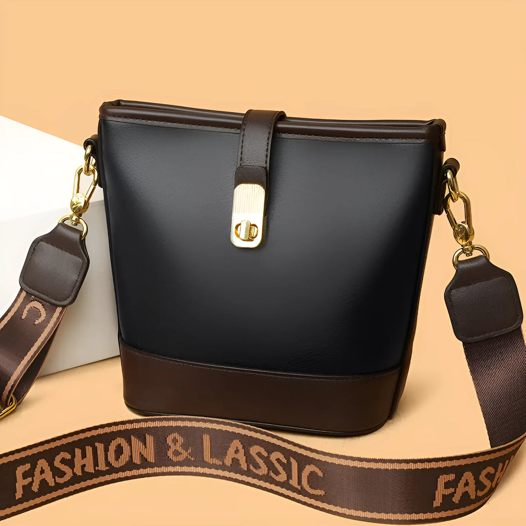 Korean style soft PU leather bucket bag with double shoulder straps in black colour showing internal organisation compartments