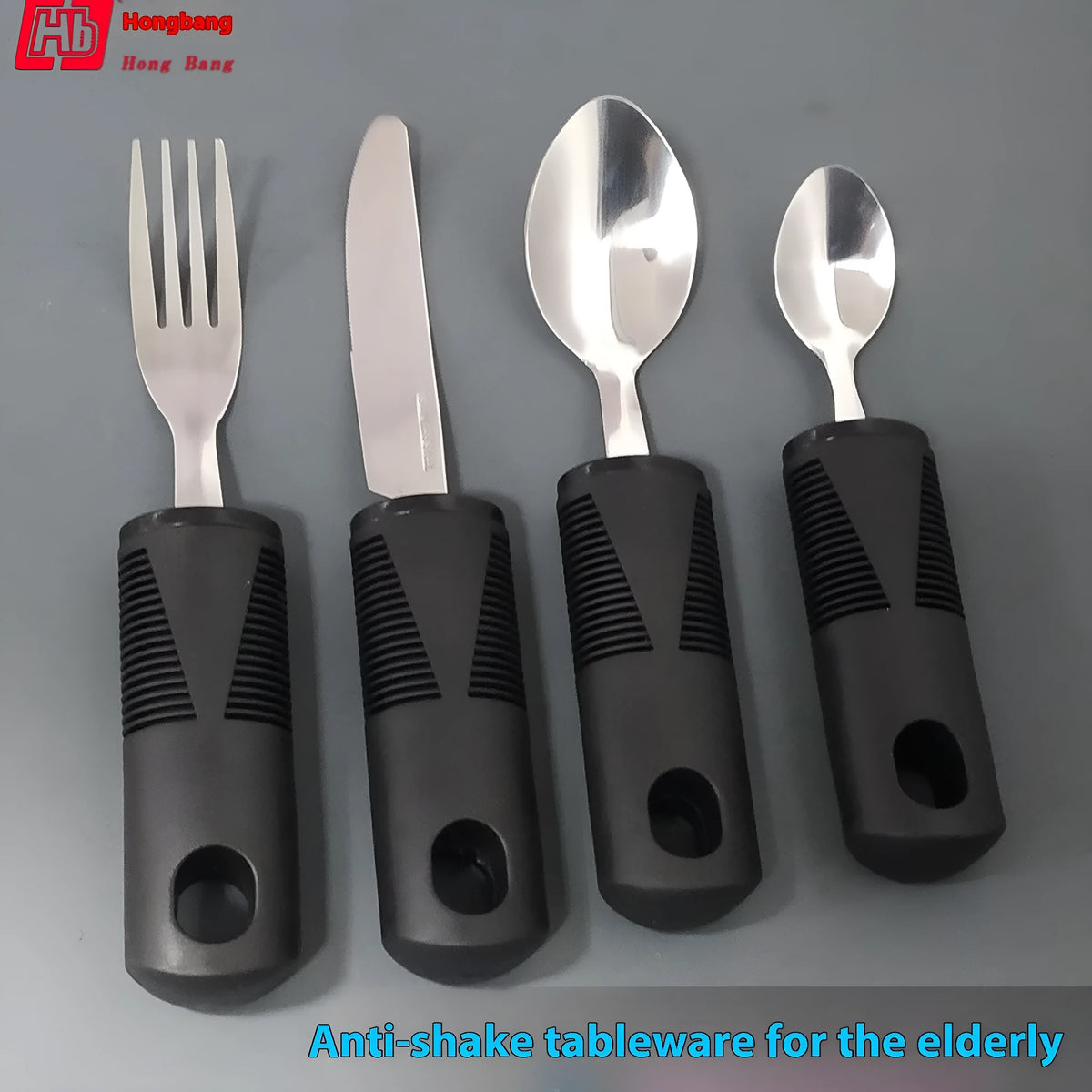 Stainless steel adaptive eating utensils with rubber handles in black and grey colour options