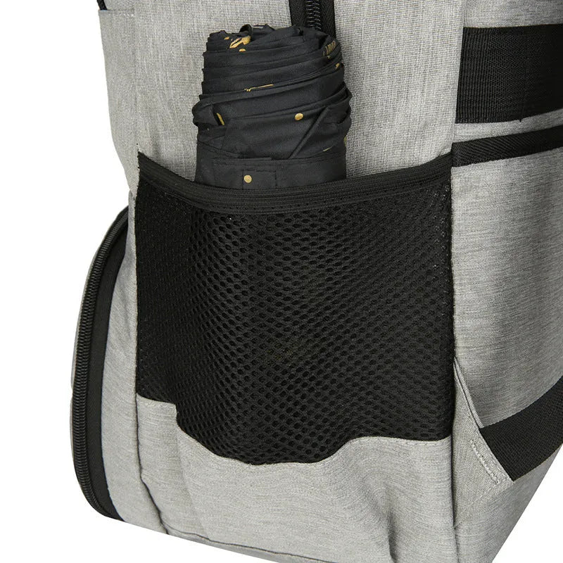 Light grey Oxford cloth picnic backpack with curved shoulder straps showing insulated compartments