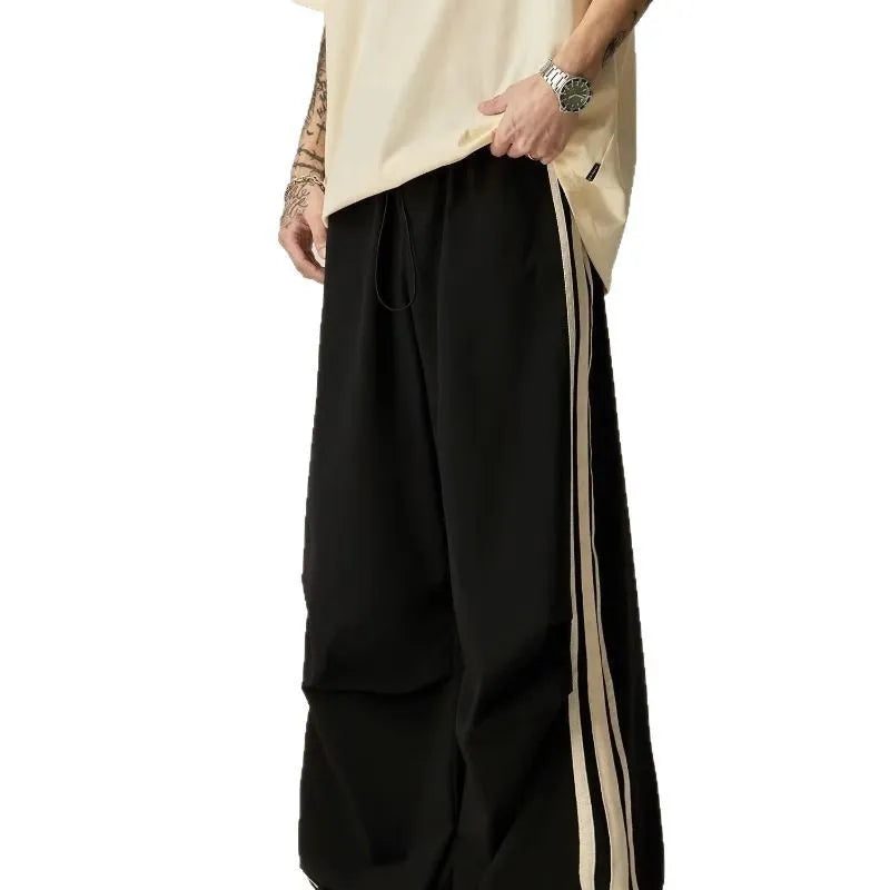 Black men's wide leg climbing pants with high waist and long straight-leg style made of polyester