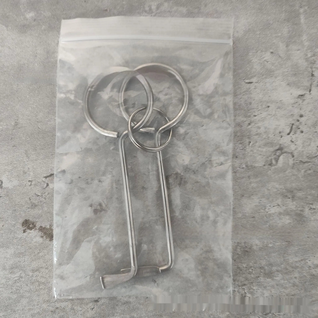 Two alloy wrench tools from a portable universal maintenance set.