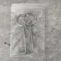 Two alloy wrench tools from a portable universal maintenance set.