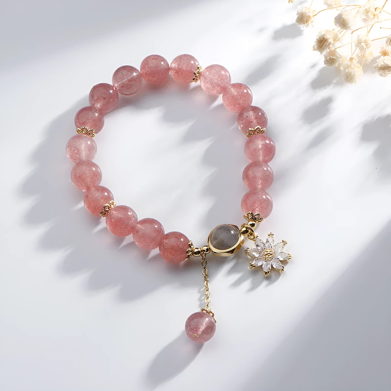 Pink strawberry quartz crystal bracelet with electroplated metal components and floral design in Mori style