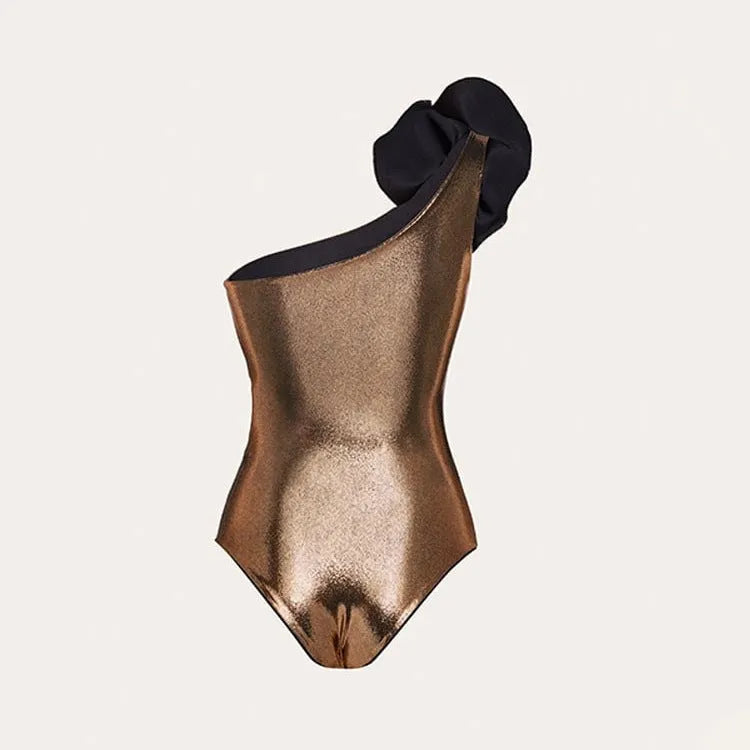 Gold handmade one-piece swimsuit with halter neck and hollow-out design on a mannequin.