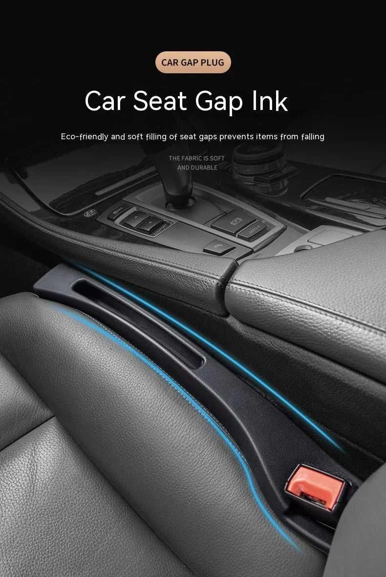 Black plastic car seat gap storage pocket with handle placed between vehicle seats.