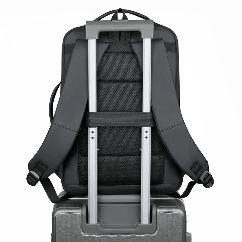 Black waterproof Oxford cloth business backpack with curved shoulder straps and derm leather accents