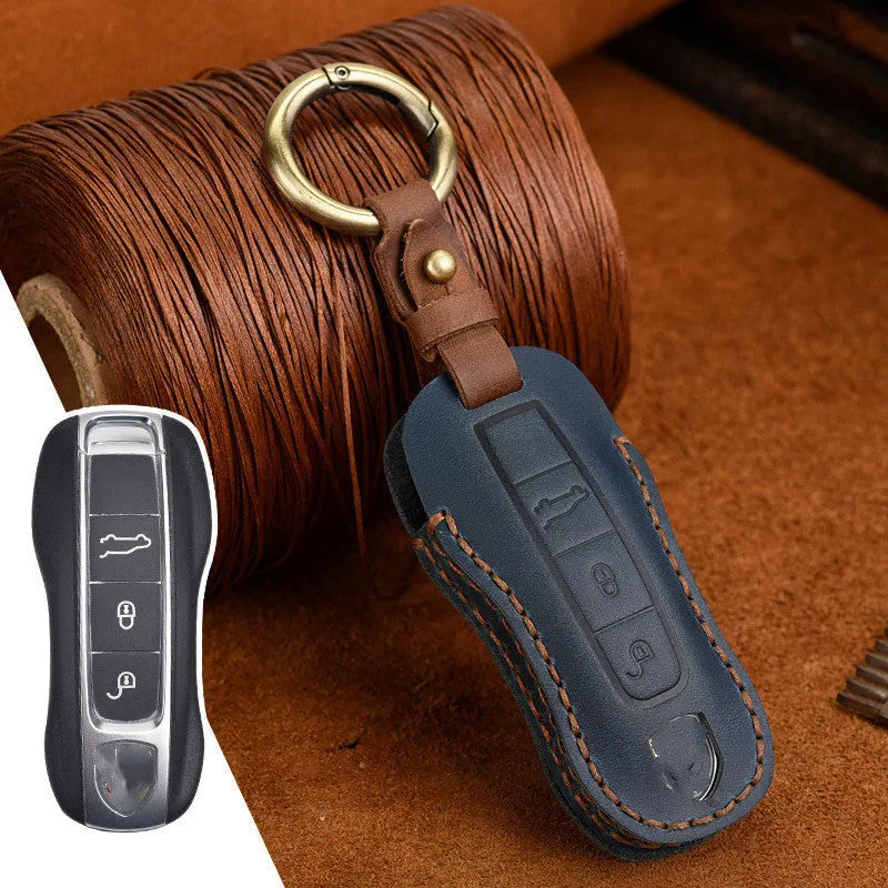 Genuine leather Porsche key cover in retro design showing blue and brown colour options