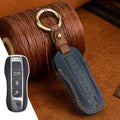 Genuine leather Porsche key cover in retro design showing blue and brown colour options