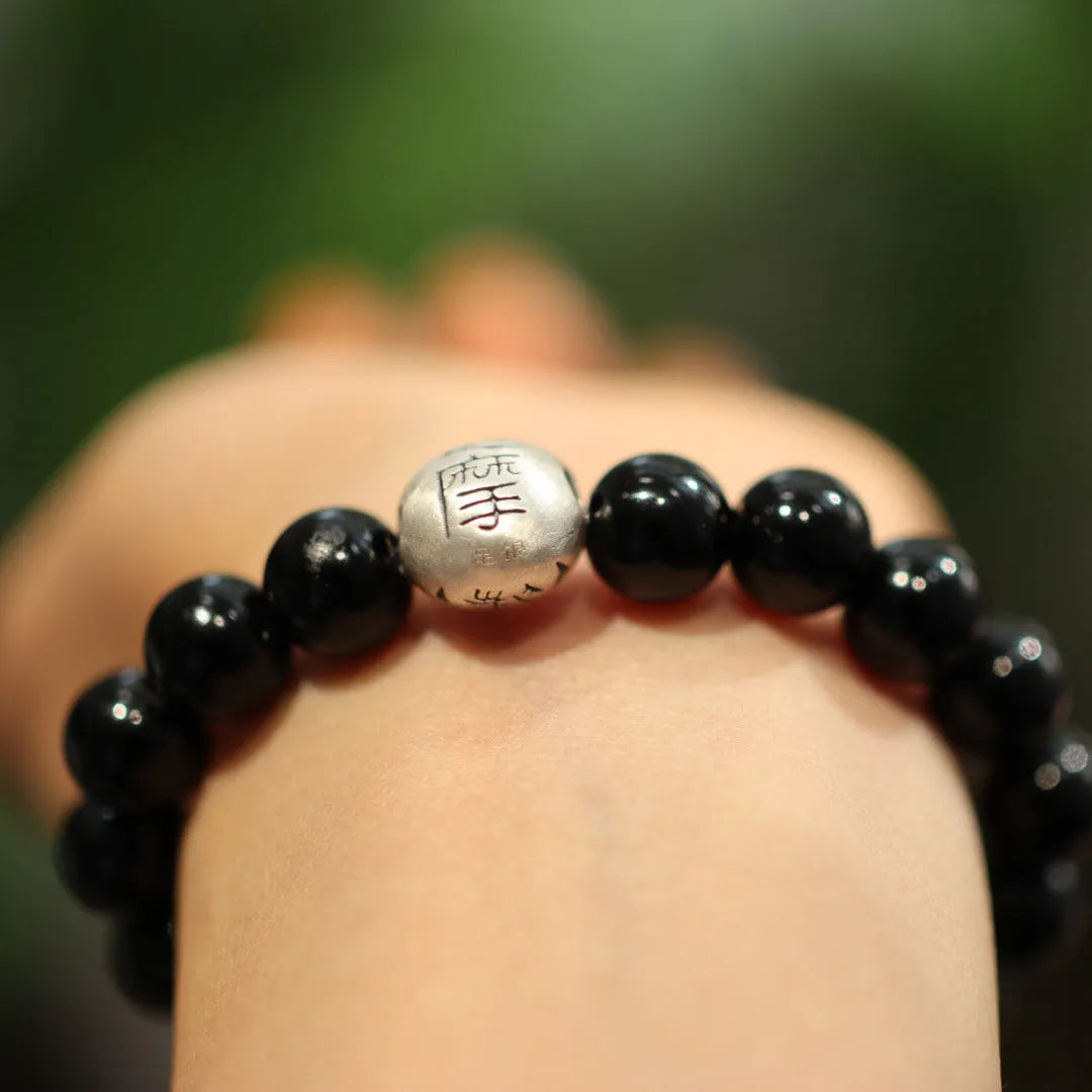 Black agate bracelet with 10mm beads and sterling silver Chinese style design
